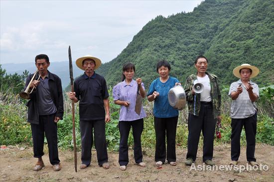 Villagers protect crops from wild boars