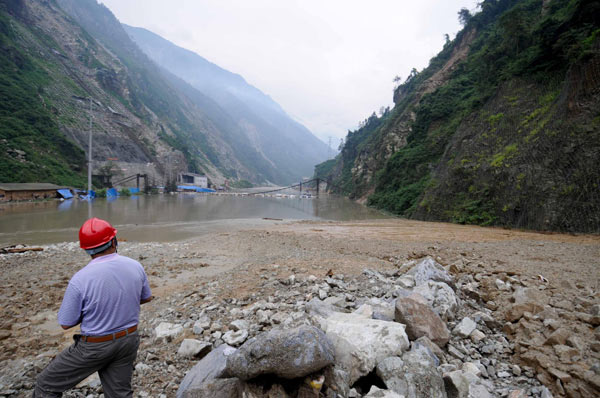 Buried road forces people to climb mountains