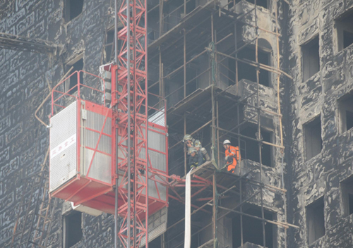 Unfinished high rise catches fire in NE China