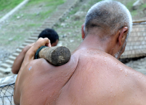 Fish bearers carry family hopes on their backs