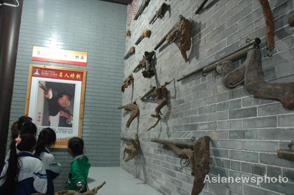 Sports sculptures shown through roots, rocks