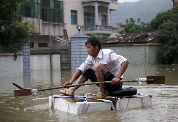 Worst floods in 56 yrs inundate E China village