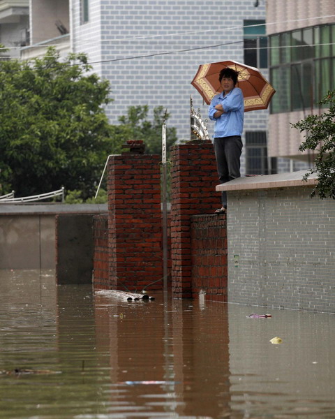 Worst floods in 56 yrs inundate E China village