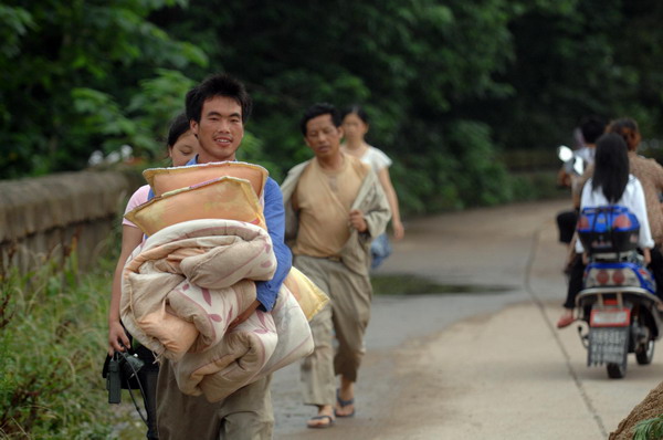 Residents evacuate amid worst floods in 56 yrs