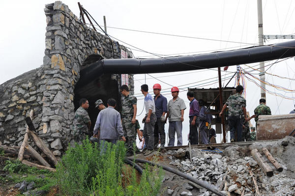 21 coal miners trapped underground in SW China