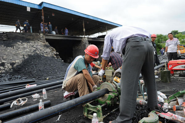 21 coal miners trapped underground in SW China