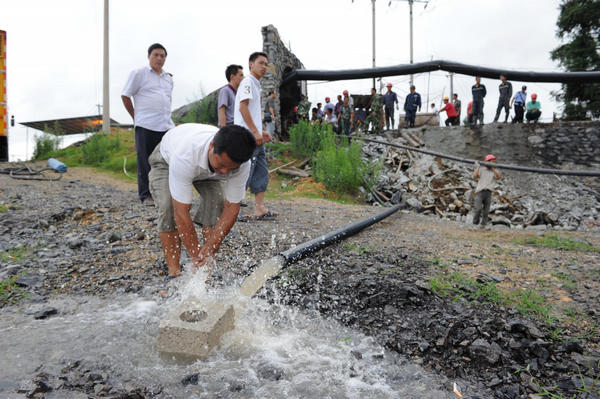 21 coal miners trapped underground in SW China