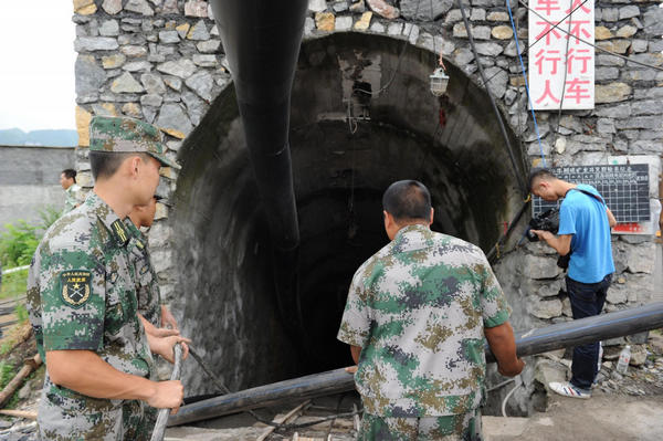 21 coal miners trapped underground in SW China