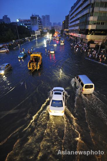 Heavy rains inundate SW China