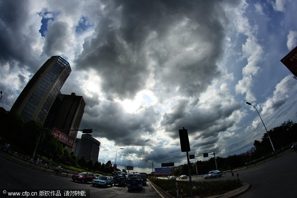 Thick clouds shield city from scorching sun