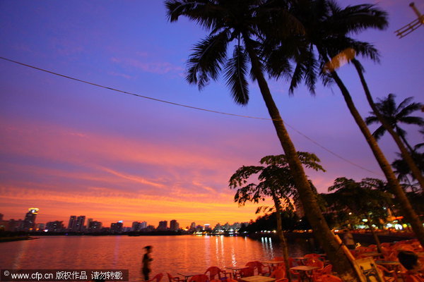 Fiery skies warn of looming tropical storm