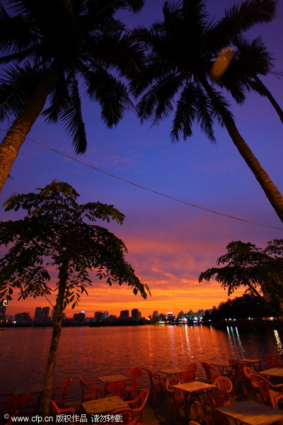 Fiery skies warn of looming tropical storm