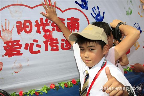 Youth from Japan quake-hit zone visit Hainan