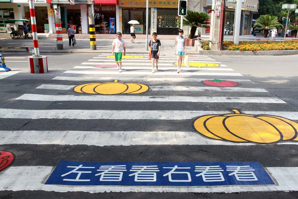 Bright colors help students cross safely