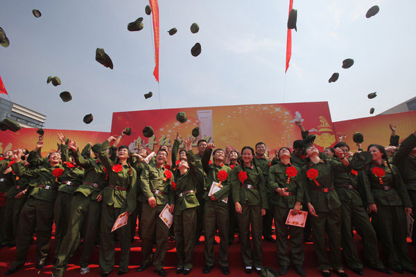 Couples marry in Red Army uniforms