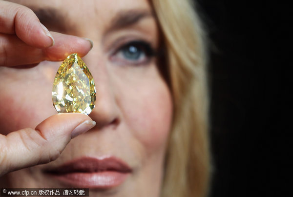 Large yellow diamond auctioned at record price