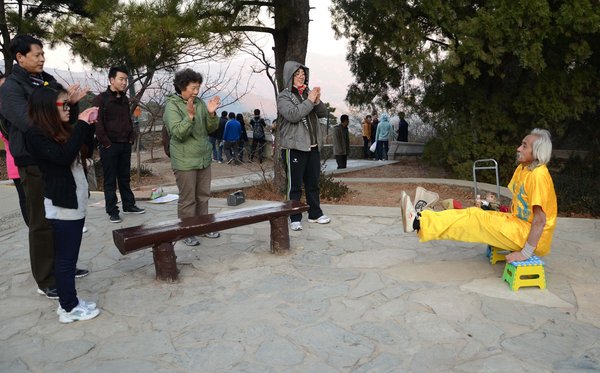 Muscleman, 80, star attraction in Beijing