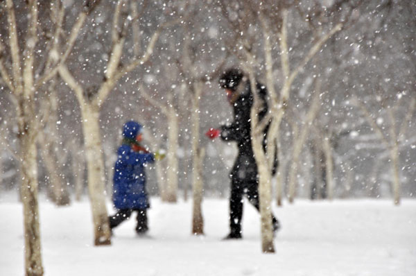 Embracing first snow of New Year