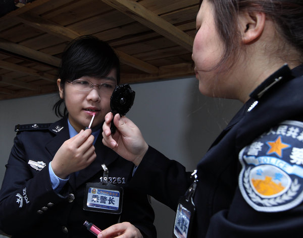 Policewomen serve on high-speed trains