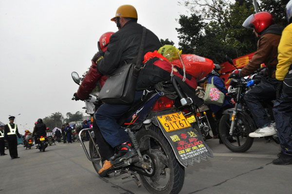 Annual mass motorbike migration revs home