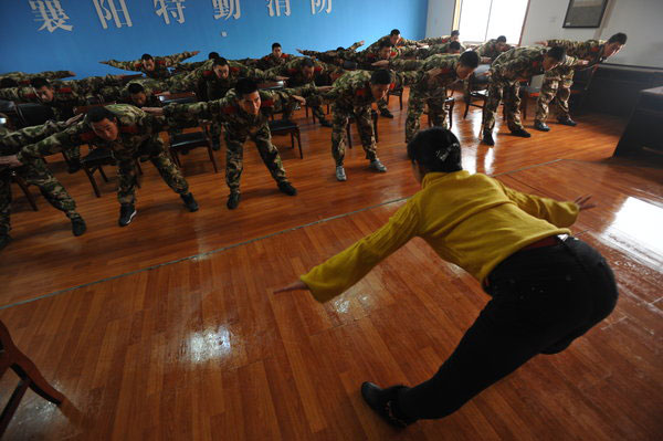 Homesick firefighters practice yoga