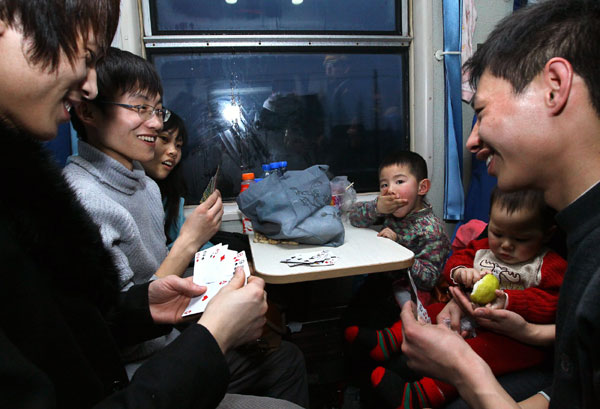 Smiles aboard homeward bound train