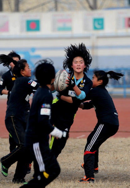 Female rugby team trains for '14 Youth Olympics