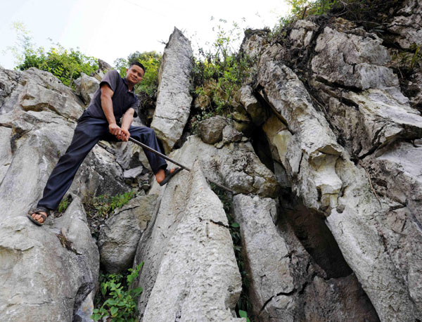 Four men move a mountain for their offspring