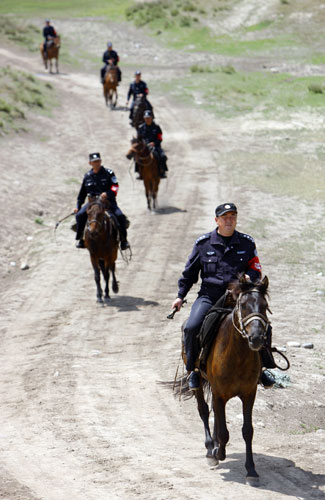 Horse patrol in NW China