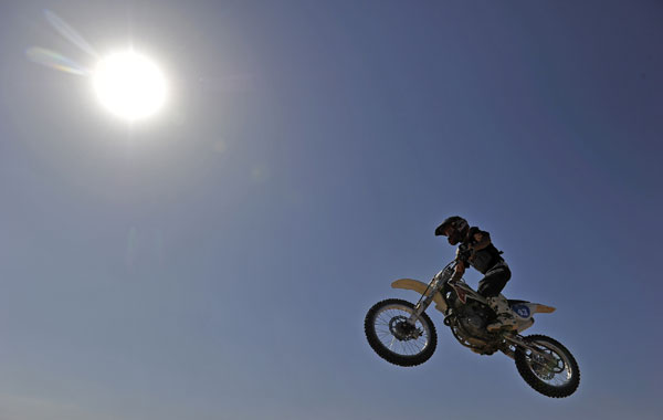 Motorcycles race through desert in NW China