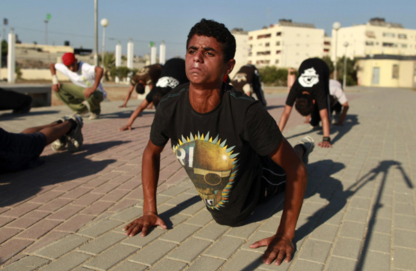 Palestinian youths show parkour skills