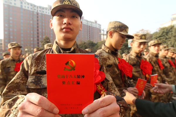 New recruits march off to a new life