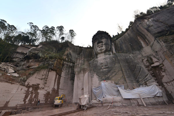 Giant Buddha carved into stone