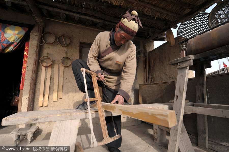 Making flour sifter now a craft of the past