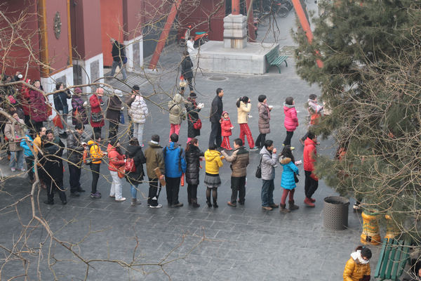 Free <EM>laba</EM> porridge at Lama Temple