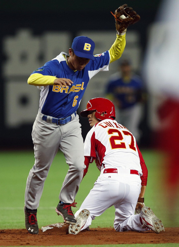 China beat Brazil qualifying first round at WBC