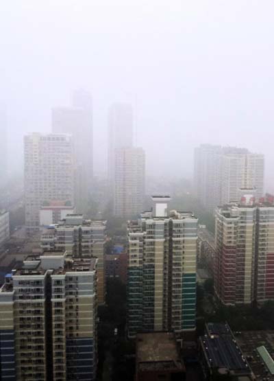 Fog descends on Beijing after rainfall