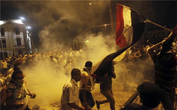 Pro-Morsi protesters, police face off in Cairo