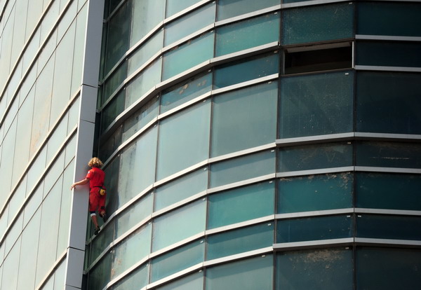 Man on the glass wall