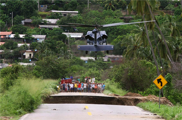 Tropical storms lash Mexico