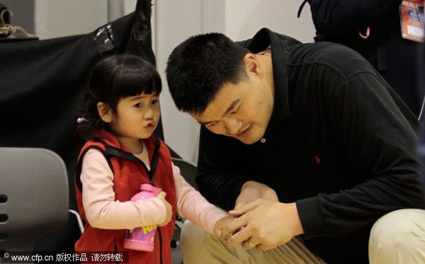 Yao with his daughter at the NBA Cares