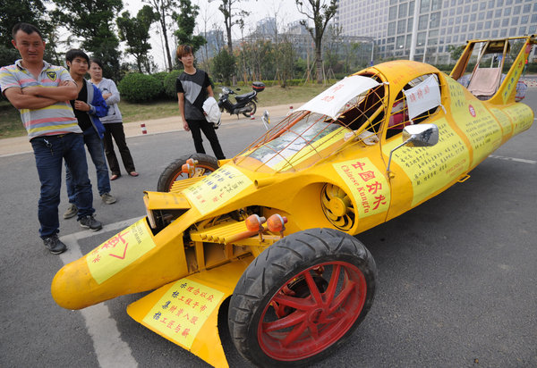 Sports car made from junk dazzles onlookers