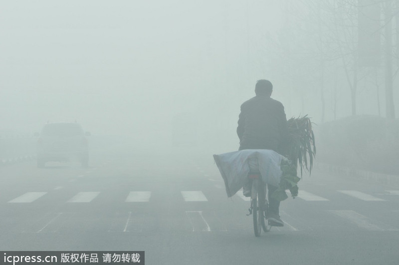 NW China city obscured by fog