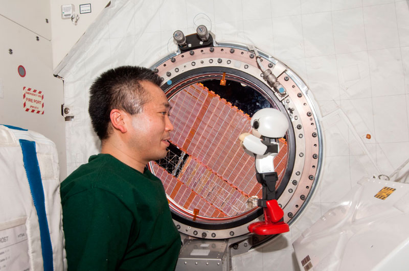 Japanese astronaut and robot talk in space