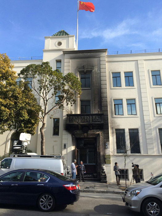 Damaged Chinese consulate open for business