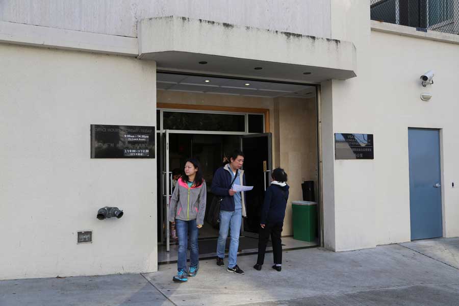 Damaged Chinese consulate open for business