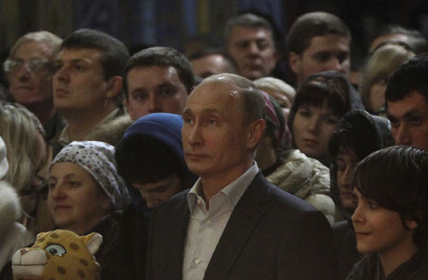 Putin attends the Orthodox Christmas