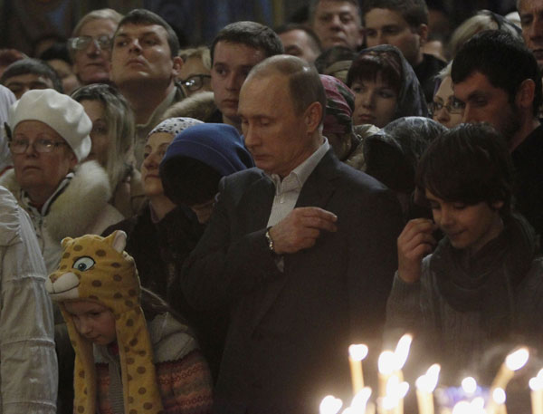 Putin attends the Orthodox Christmas