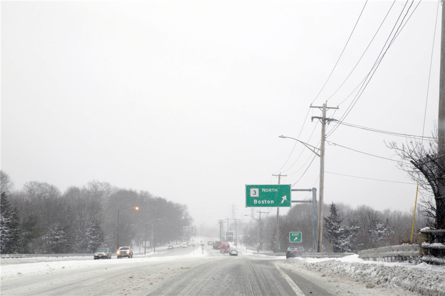 Bitter cold lingers as NE US digs out from snow