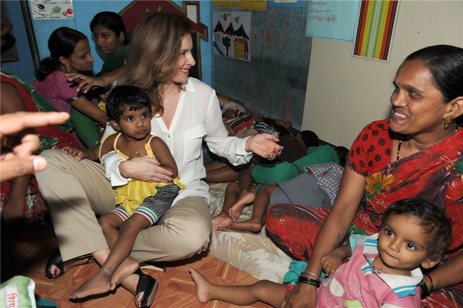 France's former first lady undertakes charity visit to India